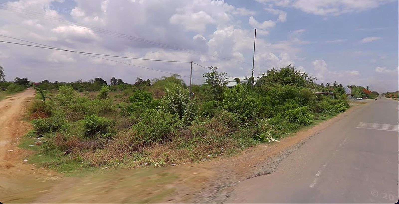 Road frontage of the 26.29-hectare industrial land for sale on National Road 44, Samrong Tong District, Kampong Speu, Cambodia — Parcel 44-SPT-26